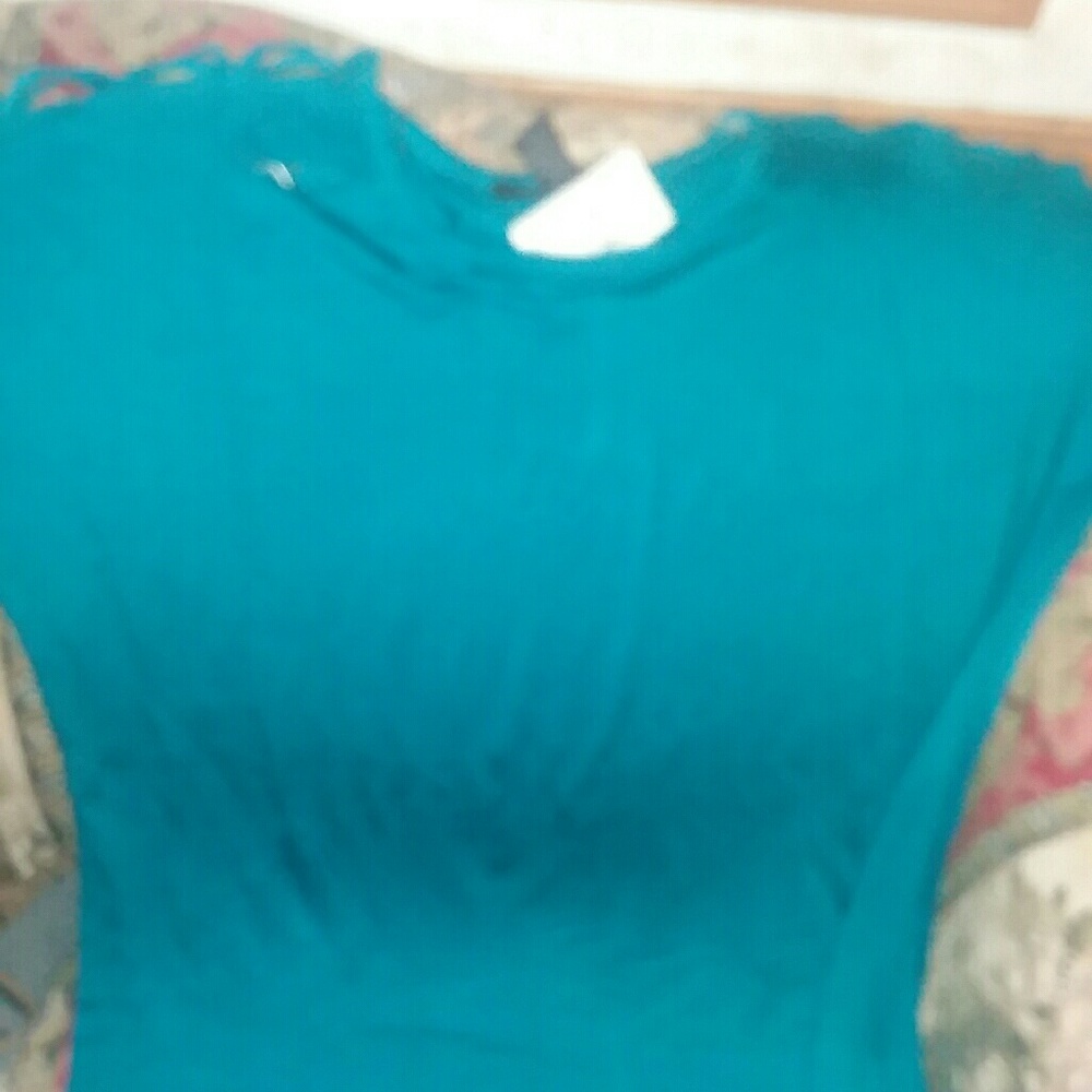 Blue top with crisscross open shoulder